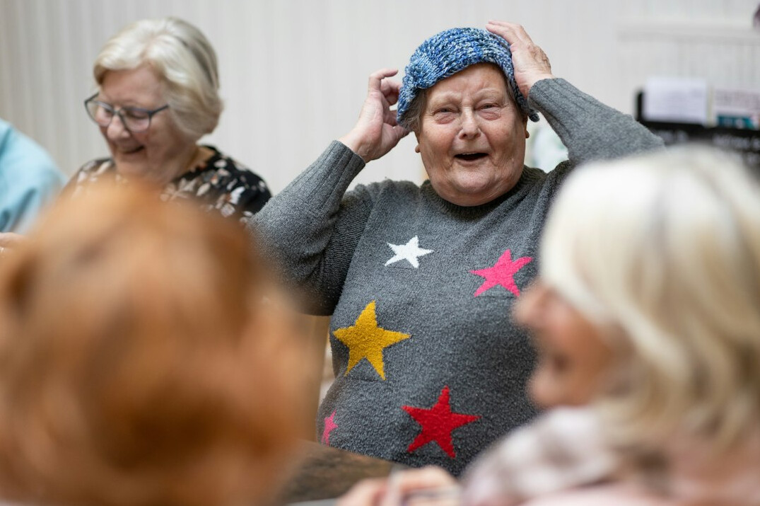 seniors exercising in bright studio