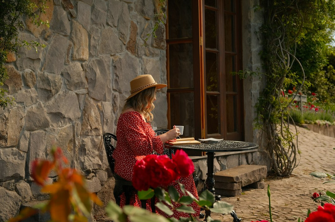 senior reading book outdoors