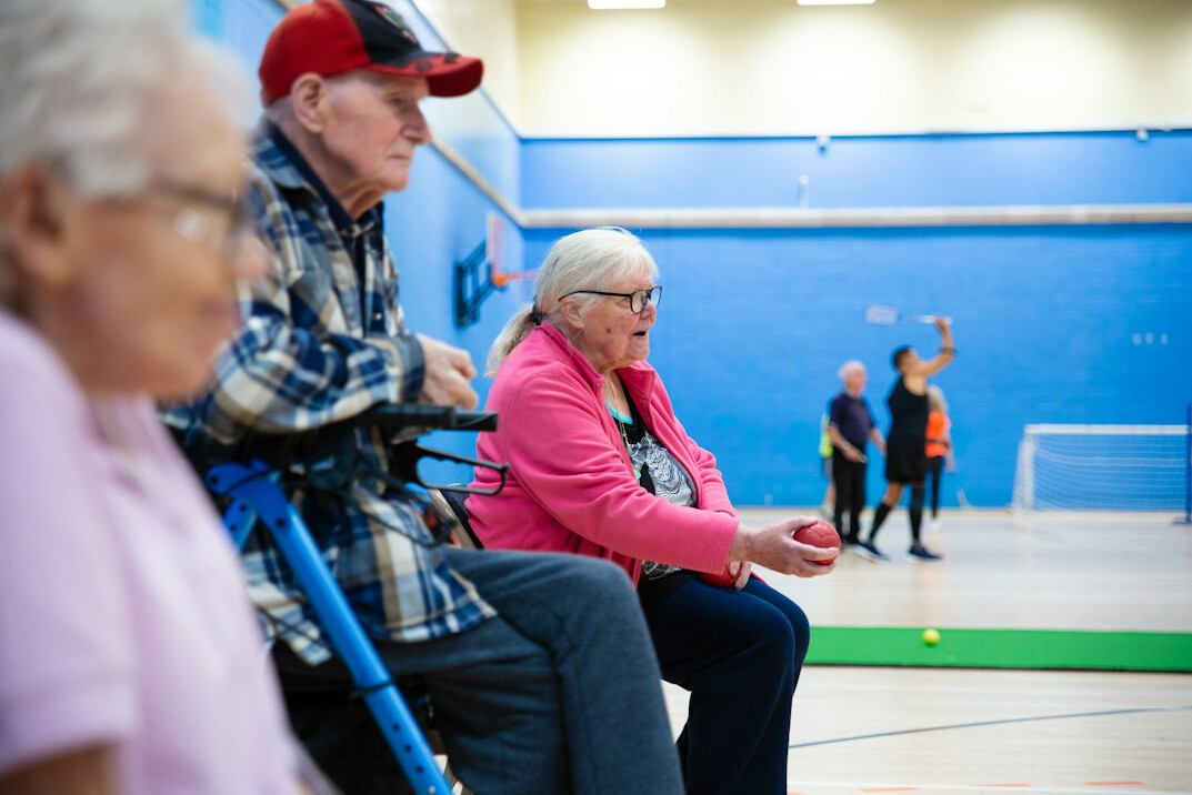 seniors exercising together in center